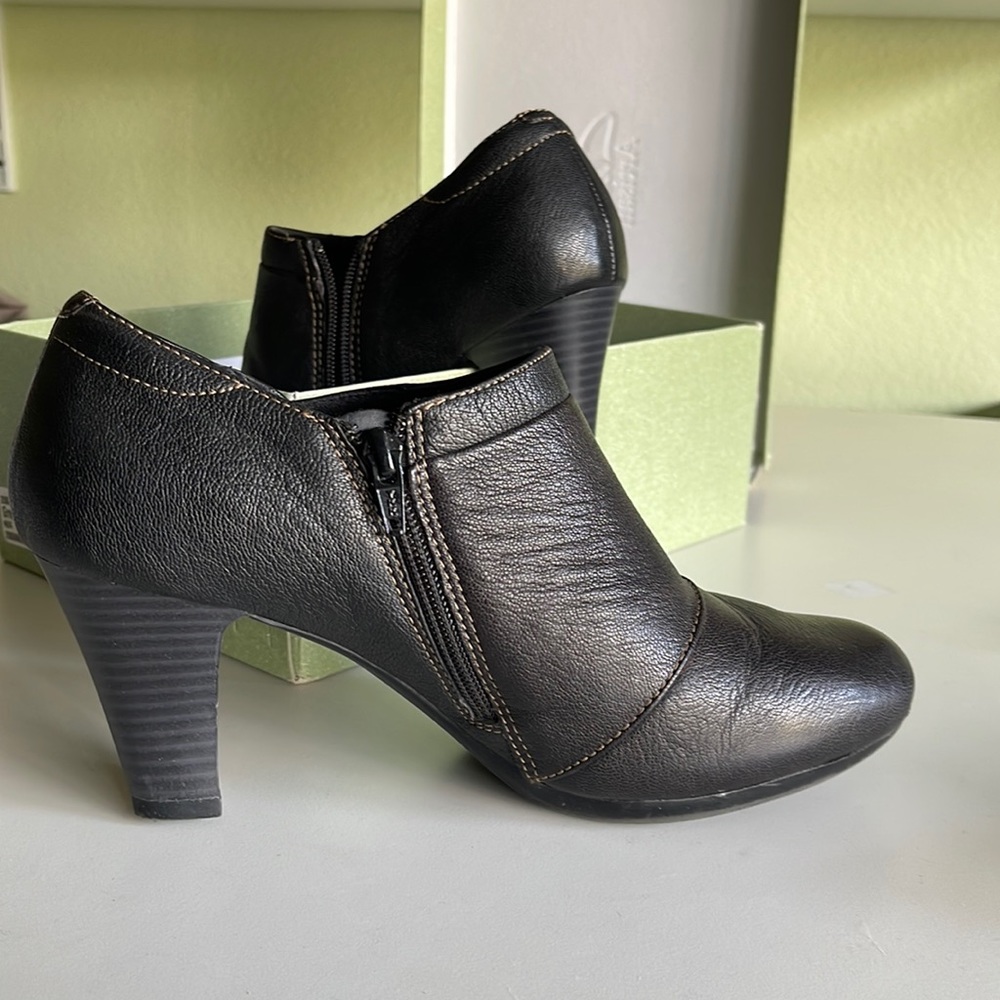 Like new Clark’s black leather booties size 10; side zip and stitching detail